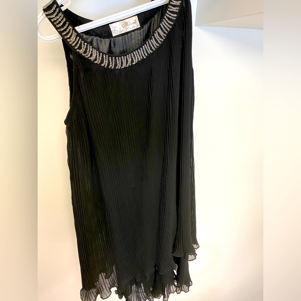 Dress mini or shirt top.